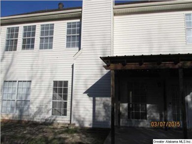 Back of House with level fenced yard