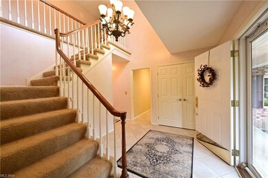 Lovely turned staircase and large front closet