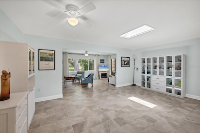 VIEW FROM KITCHEN TO LIVING & SUNROOMS