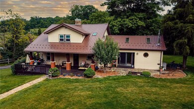 Large covered front and rear porch are the ideal l