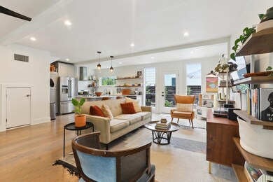 Living area featuring plenty of natural light, re