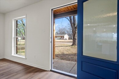 Entryway with wood-type flooring