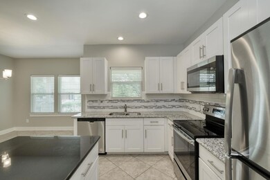 Kitchen with appliances with stainless steel fini