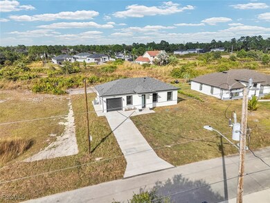 739 Foxtail St E, Lehigh Acres, FL 33974 - photo 4