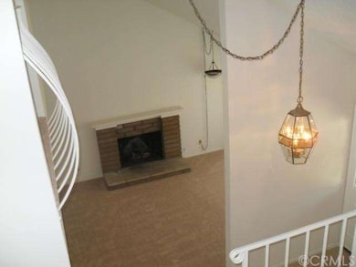Looking down from upstairs to the living room with