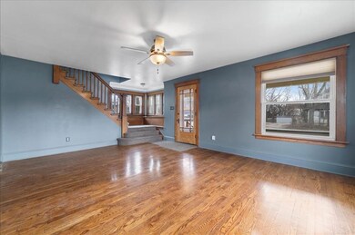 Large Living room with beautiful hardwood floors.