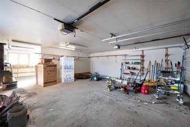 2 car garage with shop in back