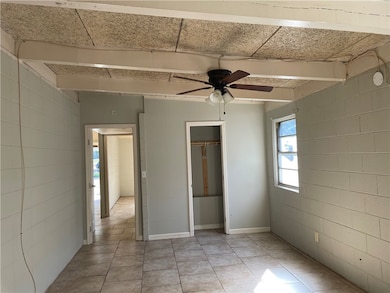 Vaulted and beamed ceilings in bedrooms.