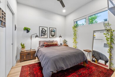 Bedroom with wood finished floors, recessed light