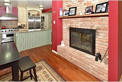 Hearth area in kitchen and breakfast area for chil