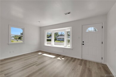 Living/Family Rm sunlight and light LVP flooring