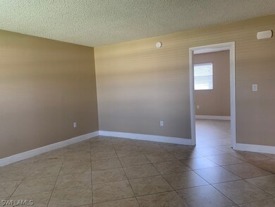 Living Room Looking Into Bedroom 1