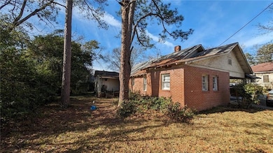 View of home's exterior with a lawn