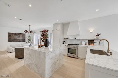 Kitchen with high end stainless steel range oven,