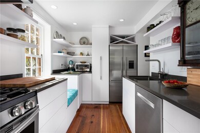 New custom kitchen with stainless appliances, new