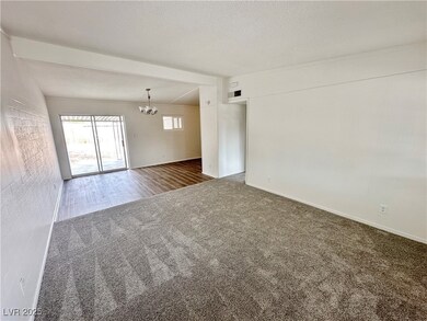 Unfurnished room featuring carpet flooring and a c