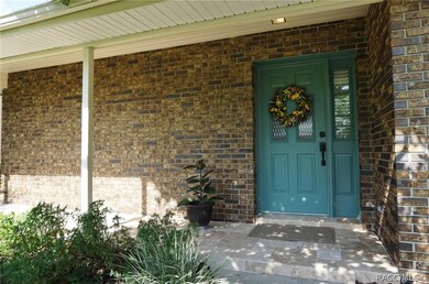 Porch with Travertine Tile