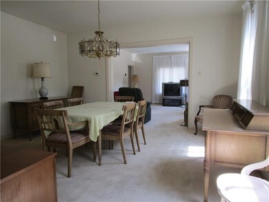 Formal dining room with built in storage.