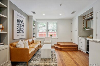 Sitting room featuring beverage cooler and wood-ty