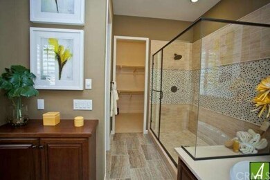 Master bathroom boast a large walk-in closet, a la