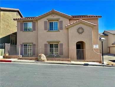 View of front of house featuring stucco siding, fe
