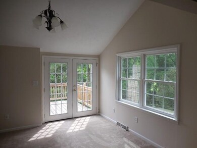 DINING ROOM WITH FRENCH DOORS to DECK