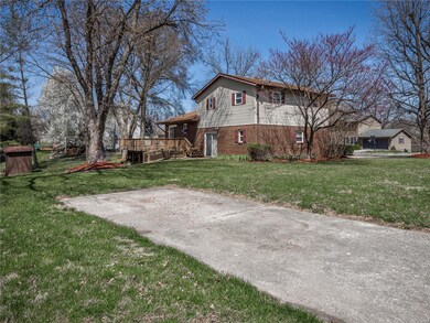 The property includes a parking pad accessible from Monticello Drive