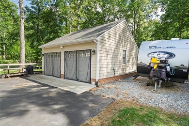 The garage is equipped with a 100-amp breaker box,