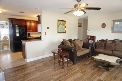 Living room with updated plank tile flooring and i