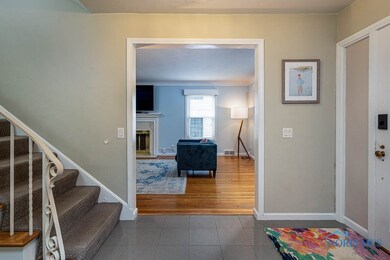 Foyer flanked by Dining and Living Rooms