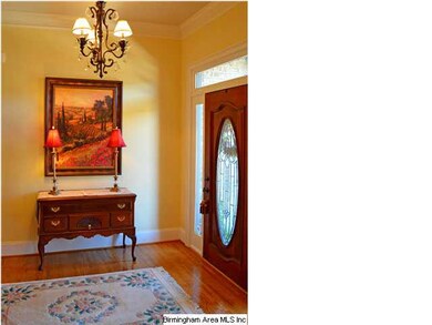 Foyer with Hardwood Floors & Crown Molding