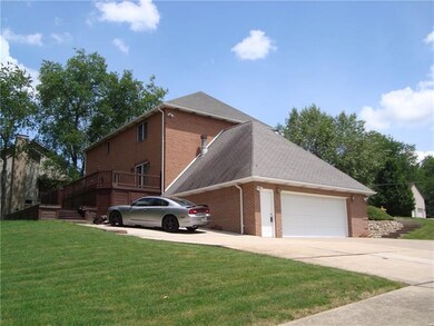 REAR OF HOUSE WITH BACK DECK