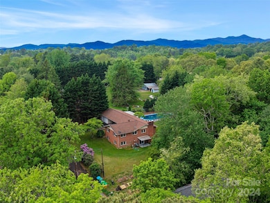 Nestled away with privacy but in highly desirable West Asheville.