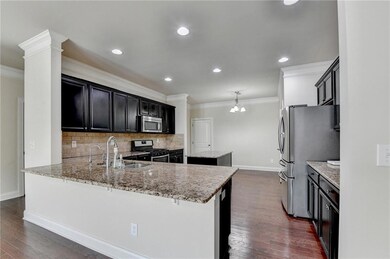 Kitchen featuring appliances with stainless steel 