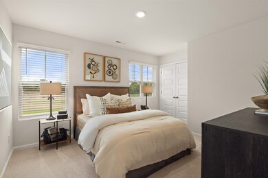 Picture is of a model in another community, not actual homesite
