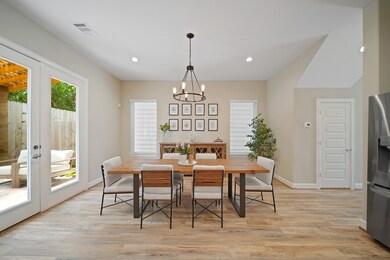 Located just off the main entry, the dining room o