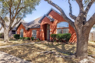 View of front of house with brick siding, roof wit