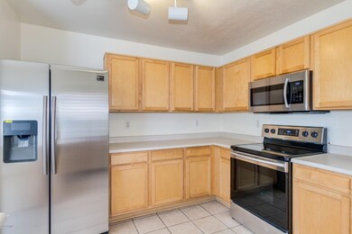 Kitchen with SS Appliances