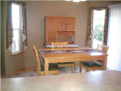 THE DINING AREA IS SURROUNDED BY SUNNY WINDOWS FAC