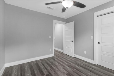 Unfurnished bedroom featuring a closet, a ceiling 