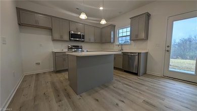 Kitchen includes a large pantry