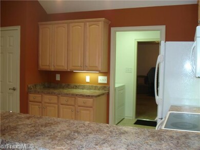 Kitchen. Beautiful gourmet kitchen complete with appliances and wonderful solar as well as recessed lighting. Lots of cabinets and bar space for entertaining and celebrating your life.