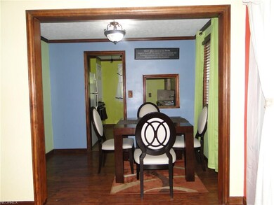 Cute Dining room with newer laminate flooring