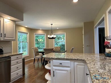 Eat in kitchen with stainless steel appliances