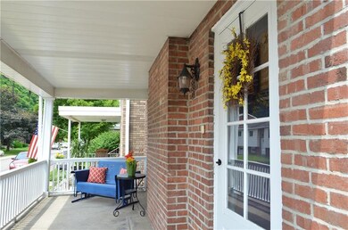 Lovely front porch looks out over the hills