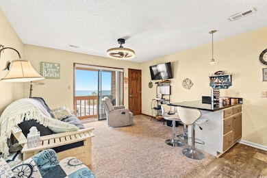 Living room featuring hardwood / wood-style floori