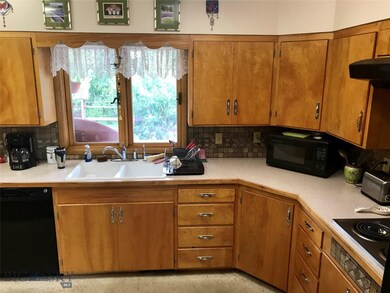 Kitchen with lots of counter space and large windo