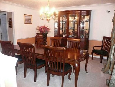 Dining Room. FORMAL DINING ROOM NEUTRAL CARPET AND