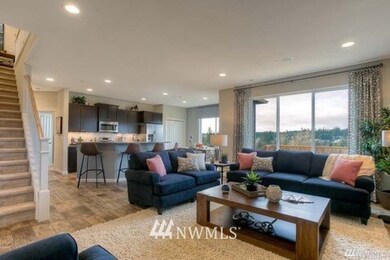Living room and kitchen with island seating