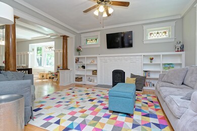 Cozy living room with built-in shelves and stained